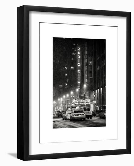 NYC Yellow Taxis in Manhattan under the Snow in front of the Radio City Music Hall-Philippe Hugonnard-Framed Art Print