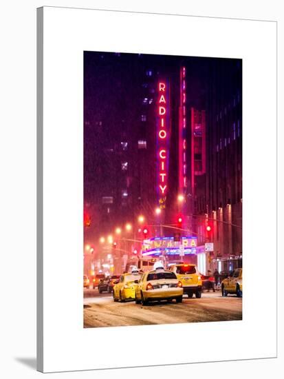 NYC Yellow Taxis in Manhattan under the Snow in front of the Radio City Music Hall-Philippe Hugonnard-Stretched Canvas