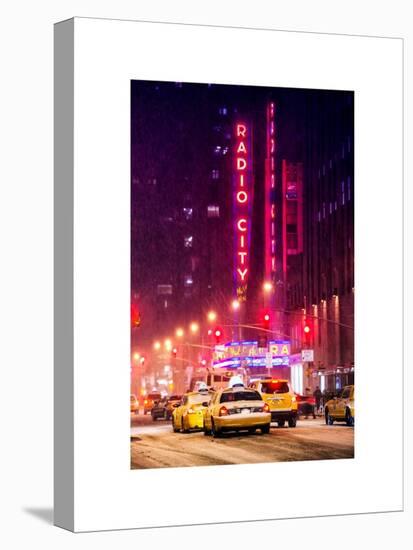 NYC Yellow Taxis in Manhattan under the Snow in front of the Radio City Music Hall-Philippe Hugonnard-Stretched Canvas