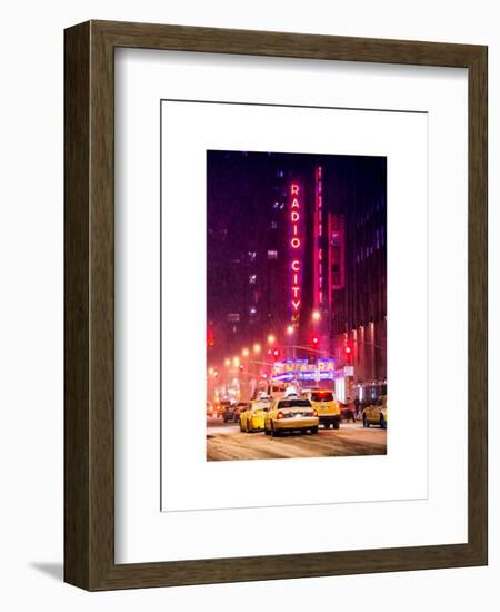 NYC Yellow Taxis in Manhattan under the Snow in front of the Radio City Music Hall-Philippe Hugonnard-Framed Art Print