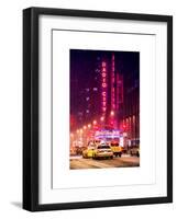 NYC Yellow Taxis in Manhattan under the Snow in front of the Radio City Music Hall-Philippe Hugonnard-Framed Art Print