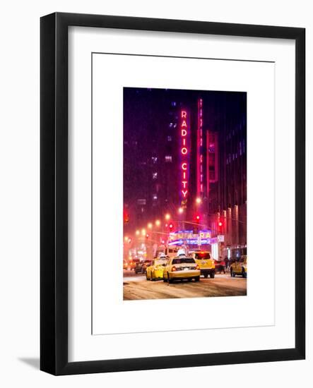 NYC Yellow Taxis in Manhattan under the Snow in front of the Radio City Music Hall-Philippe Hugonnard-Framed Art Print