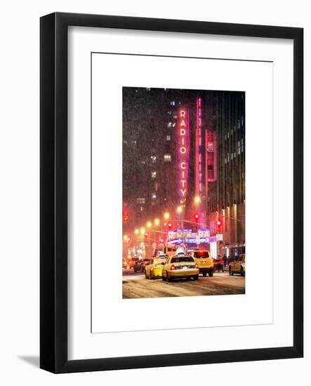 NYC Yellow Taxis in Manhattan under the Snow in front of the Radio City Music Hall-Philippe Hugonnard-Framed Art Print