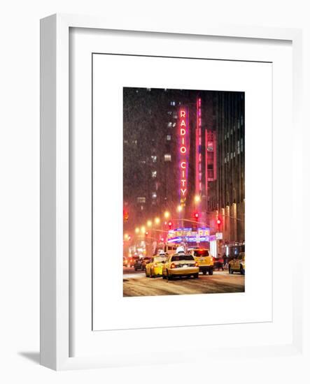 NYC Yellow Taxis in Manhattan under the Snow in front of the Radio City Music Hall-Philippe Hugonnard-Framed Art Print