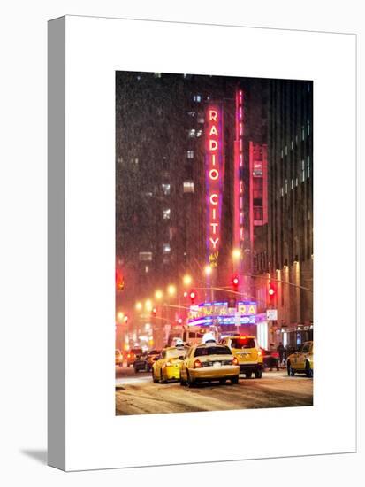 NYC Yellow Taxis in Manhattan under the Snow in front of the Radio City Music Hall-Philippe Hugonnard-Stretched Canvas