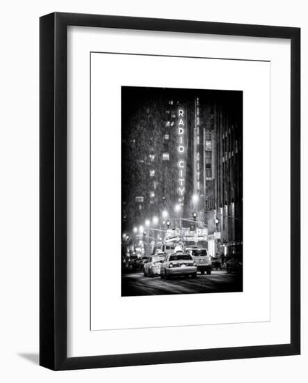 NYC Yellow Taxis in Manhattan under the Snow in front of the Radio City Music Hall-Philippe Hugonnard-Framed Art Print