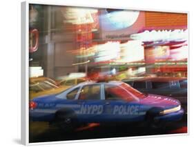 Nypd Police Car Speeding Through Times Square, New York City, New York, USA-null-Framed Photographic Print