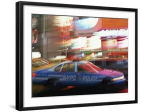 Nypd Police Car Speeding Through Times Square, New York City, New York, USA-null-Framed Photographic Print