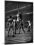 NYU vs. North Carolina in College Basketball Game at Madison Square Garden-Gjon Mili-Mounted Premium Photographic Print