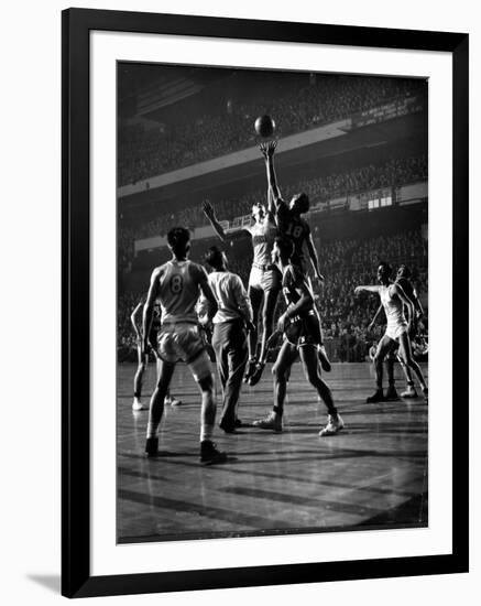 NYU vs. North Carolina in College Basketball Game at Madison Square Garden-Gjon Mili-Framed Photographic Print