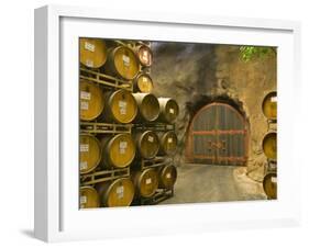 Oak Barrels Stacked Outside of Door at Ironstone Winery, Calaveras County, California, USA-Janis Miglavs-Framed Photographic Print