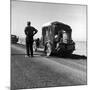 Oakie Family Stalled on Desolate Track of Highway in Desert in Southern California-Dorothea Lange-Mounted Photographic Print