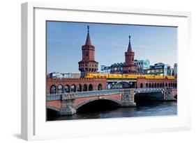 Oberbaum Bridge across River Spree between Friedrichshain and Kreuzberg, Berlin Germany-null-Framed Art Print