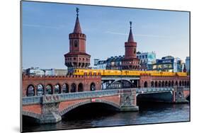 Oberbaum Bridge across River Spree between Friedrichshain and Kreuzberg, Berlin Germany-null-Mounted Art Print