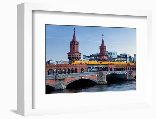 Oberbaum Bridge across River Spree between Friedrichshain and Kreuzberg, Berlin Germany-null-Framed Art Print