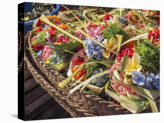 Offerings of flowers for sale, Denpasar, Bali, Indonesia, Southeast Asia, Asia-Melissa Kuhnell-Stretched Canvas