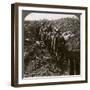Officer Watching His Men File into a Dug-Out to Avoid a German Strafe, World War I, 1914-1918-null-Framed Photographic Print
