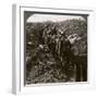 Officer Watching His Men File into a Dug-Out to Avoid a German Strafe, World War I, 1914-1918-null-Framed Photographic Print