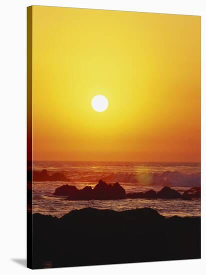 Offshore Rocks at Sunset, Pacific Grove, Monterey Peninsula, California, USA-Stuart Westmoreland-Stretched Canvas