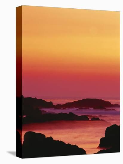 Offshore Rocks at Sunset, Pacific Grove, Monterey Peninsula, California, USA-Stuart Westmoreland-Stretched Canvas