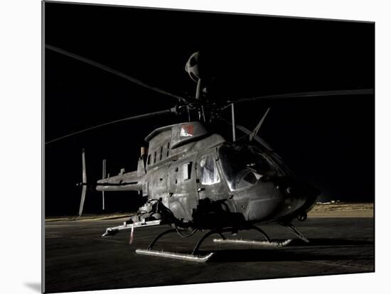 OH-58D Kiowa Sits on its Pad at Night-Stocktrek Images-Mounted Photographic Print
