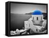 Oia Town on Santorini Island, Greece. Black and White Styled with Blue Dome of Traditional Church O-Michal Bednarek-Framed Stretched Canvas