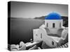 Oia Town on Santorini Island, Greece. Black and White Styled with Blue Dome of Traditional Church O-Michal Bednarek-Stretched Canvas