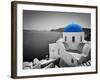 Oia Town on Santorini Island, Greece. Black and White Styled with Blue Dome of Traditional Church O-Michal Bednarek-Framed Photographic Print