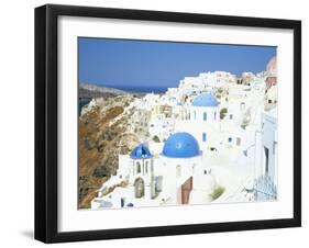 Oia with Blue Domed Churches and Whitewashed Buildings, Santorini (Thira), Cyclades Islands, Greece-Lee Frost-Framed Photographic Print