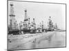 Oil Derricks on a Beach in California-null-Mounted Photographic Print