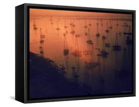 Oil Rigs Dating from the 1920's Dot the Shallows of Galveston Bay-Ralph Crane-Framed Stretched Canvas