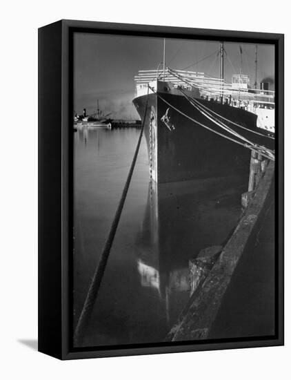 Oil Tanker Tied Up at Dock While it Is Being Loaded with Barrels of Oil-Margaret Bourke-White-Framed Stretched Canvas