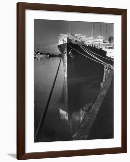 Oil Tanker Tied Up at Dock While it Is Being Loaded with Barrels of Oil-Margaret Bourke-White-Framed Photographic Print