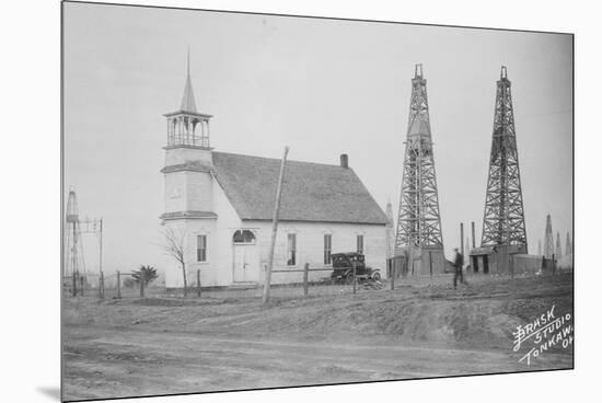 Oil Well Construction behind Church-null-Mounted Premium Photographic Print