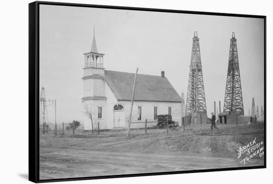 Oil Well Construction behind Church-null-Framed Stretched Canvas