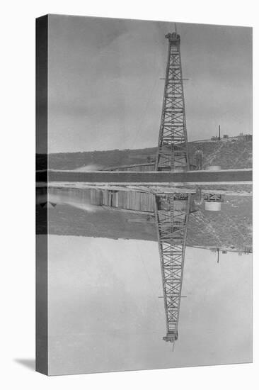 Oil Well Reflected in Pond-null-Stretched Canvas