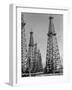 Oil Well Rigs in a Texaco Oil Field-Margaret Bourke-White-Framed Photographic Print