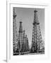 Oil Well Rigs in a Texaco Oil Field-Margaret Bourke-White-Framed Photographic Print