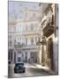 Old American Car Driving Along Quiet Street in Havana Centro, Havana, Cuba-null-Mounted Photographic Print