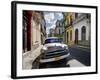 Old American Plymouth Car Parked on Deserted Street of Old Buildings, Havana Centro, Cuba-Lee Frost-Framed Photographic Print