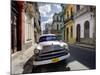 Old American Plymouth Car Parked on Deserted Street of Old Buildings, Havana Centro, Cuba-Lee Frost-Mounted Photographic Print