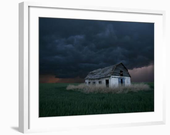 Old Barn Stands in a Wheat Field as a Thunderstorm Passes in the Distance Near Ogallah, Kansas-null-Framed Photographic Print