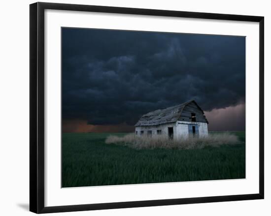 Old Barn Stands in a Wheat Field as a Thunderstorm Passes in the Distance Near Ogallah, Kansas-null-Framed Photographic Print