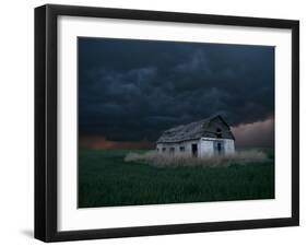 Old Barn Stands in a Wheat Field as a Thunderstorm Passes in the Distance Near Ogallah, Kansas-null-Framed Photographic Print