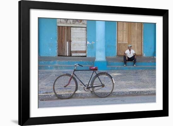 Old Bicycle Propped Up Outside Old Building with Local Man on Steps-Lee Frost-Framed Photographic Print