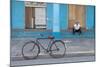 Old Bicycle Propped Up Outside Old Building with Local Man on Steps-Lee Frost-Mounted Photographic Print