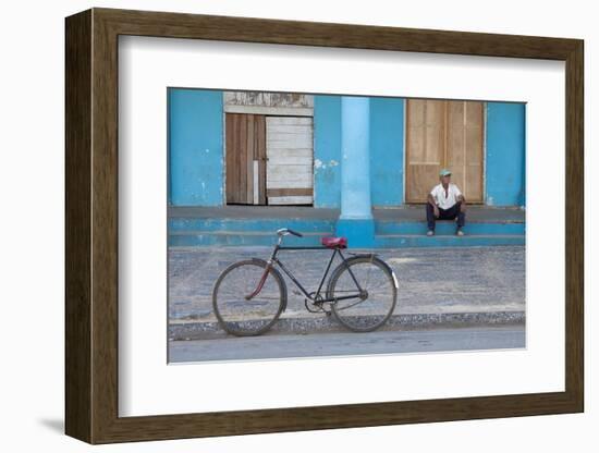 Old Bicycle Propped Up Outside Old Building with Local Man on Steps-Lee Frost-Framed Photographic Print