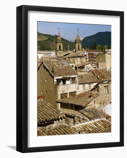 Old Buildings with Tiled Roofs and a Church Behind at Estella on the Camino in Navarre, Spain-Ken Gillham-Framed Photographic Print