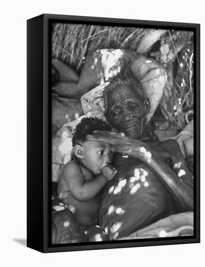 Old Bushman Woman Holding a Baby-null-Framed Stretched Canvas