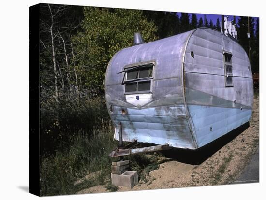 Old Camper at a Car Cemetery in Colorado-Michael Brown-Stretched Canvas